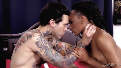 Black haired brunette with a tattooed pussy makes love