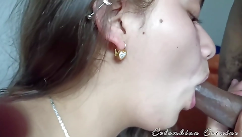 Horny brunette is eating cum in a interracial scene