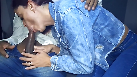 Brazilian brunette in red dress rides her driver's cock