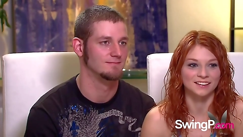 Hot group sex with a redhead and a blonde babe in lingerie