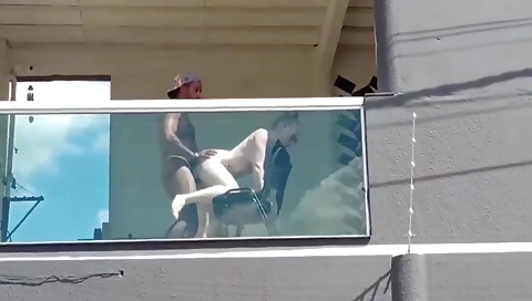 Tattooed blonde babe is getting fucked in the office