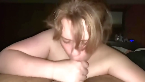 Blonde milf fucks her boyfriend's throat on the couch