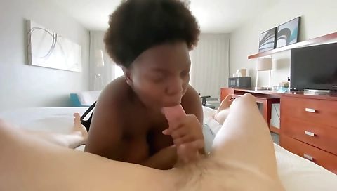 Ebony girl with large natural boobs gets a deepthroat blowjob