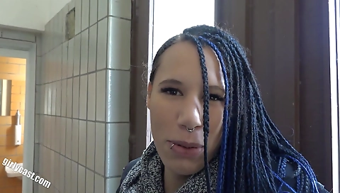 Intertwined sex in the street for a blonde and black man