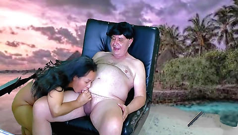 Amateur asian girl with a hairy pussy is playing with a cock