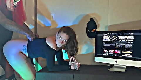 Brunette girl in a sexy black dress riding a huge cock