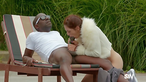 Milf with hairy pussy rides a big cock in the surf house