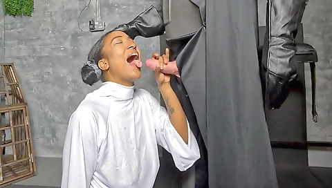 Ebony with a tattooed face gets fucked in the feet