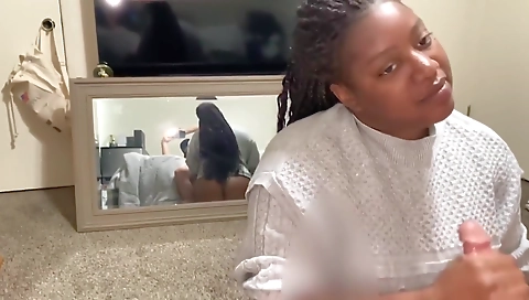 Horny brunette ebony milf sucking a white cock in a g-string