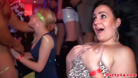 Interracial sex in the dance floor in red dress and stockings