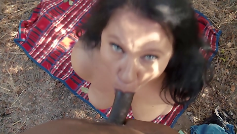 Latina milf is blowing her BF's hard cock in the backyard