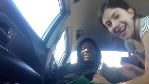Brunette and big black dick in a car deepthroating
