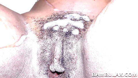 Ebony couple having sex and cumming on his hairy pussy